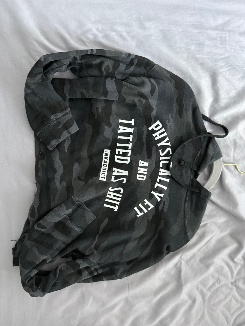 Black Camo Graphic Hoodie with Bold White Text